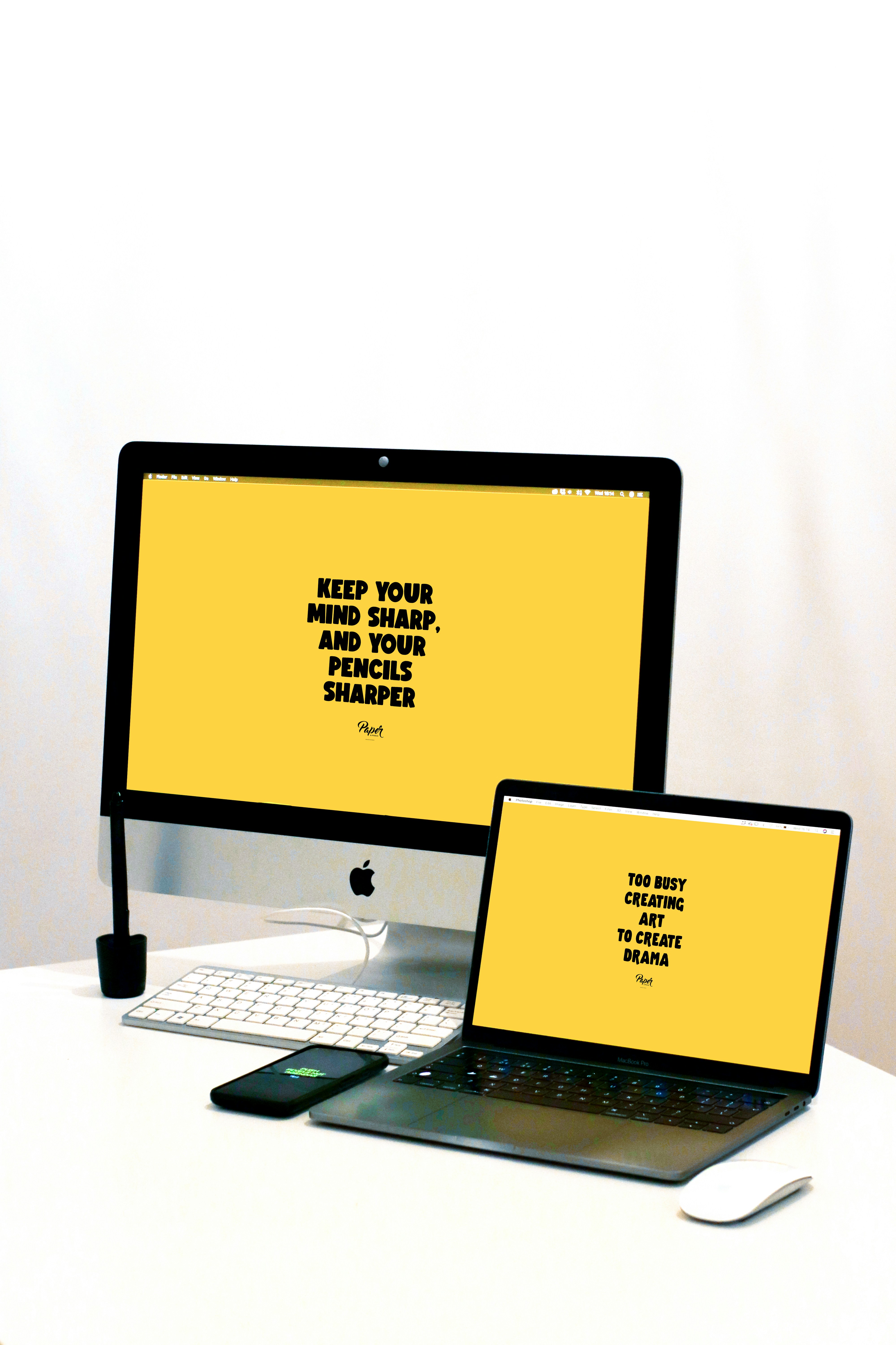 Imac and Macbook Pro Desktops in office